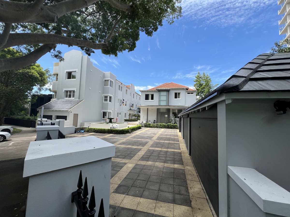 Darling Point strata complex — whole-of-building remediation, restored render and grounds